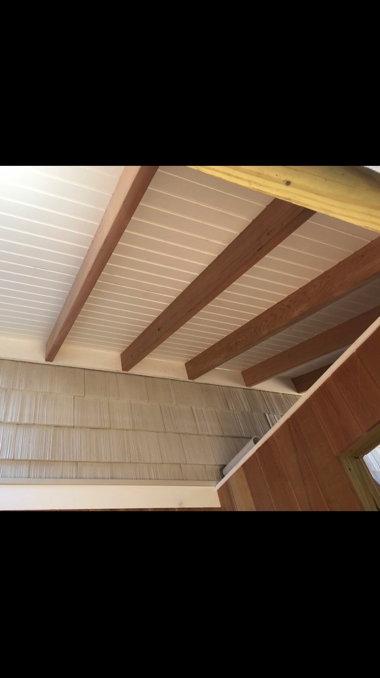 Custom beadboard ceiling with exposed wood beams — Cole James Builders NJ